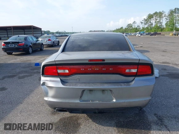 2014 Dodge Charger SE with VIN 2C3CDXBGXEH284832, listed as a IAAI auction lot 42069294 with 186,273 mi miles and . Bid and sale history available at carsss.com. Image 16.