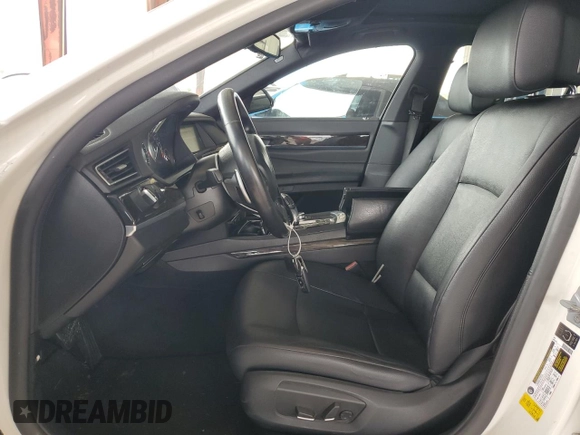 2013 BMW 7 Series 740i with VIN WBAYA6C5XDD143639, listed as a Copart auction lot 62296694 with 97,082 mi miles and Salvage Title. Bid and sale history available at carsss.com. Image 7.