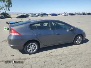 2011 Honda Insight EX z VIN JHMZE2H71BS006434, wystawiony jako Copart lot #58045495 z przebiegiem 270 645 mil mil oraz Czysty tytuł • Clean title. Historia ofert i sprzedaży dostępna na DreamBid. Obrazek 3.