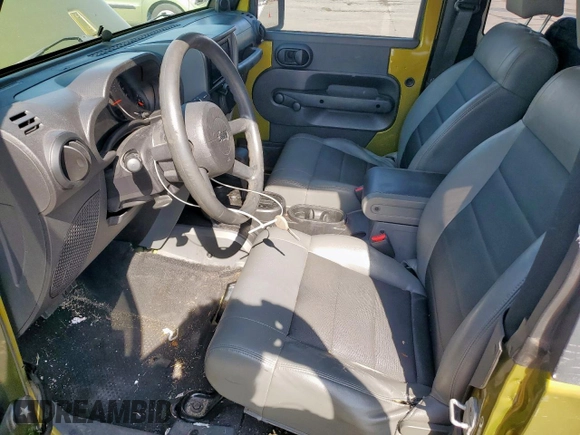 2008 Jeep Wrangler X with VIN 1J4FA24148L617265, listed as a Copart auction lot 53054495 with 143,270 mi miles and Salvage Title. Bid and sale history available at DreamBid. Image 7.