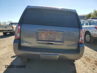 2019 GMC Yukon SLT with VIN 1GKS2BKC8KR103093, listed as a Copart auction lot 74321584 with 35,927 mi miles and Clean Title. Bid and sale history available at carsss.com. Image 6.