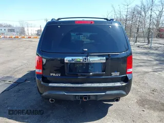 2014 Honda Pilot Touring with VIN 5FNYF4H94EB049495, listed as a IAAI auction lot 41937134 with 149,445 mi miles and . Bid and sale history available at carsss.com. Image 16.