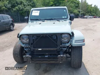 2023 Jeep Wrangler Sahara with VIN 1C4JJXP6XPW554741, listed as a IAAI auction lot 42380681 with 15,148 mi miles and . Bid and sale history available at DreamBid. Image 13.