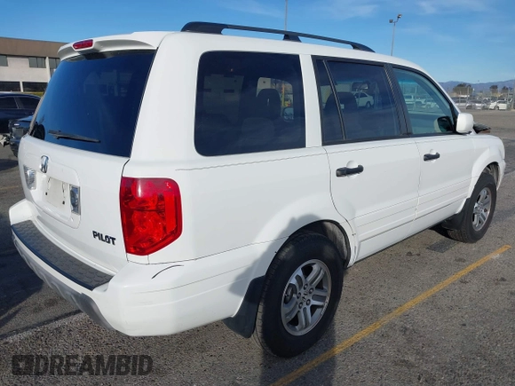 2005 Honda Pilot EX with VIN 5FNYF18475B060655, listed as a IAAI auction lot 41381619 with 142,680 mi miles and . Bid and sale history available at DreamBid. Image 4.