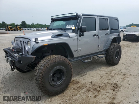 2013 Jeep Wrangler Unlimited Rubicon with VIN 1C4BJWFG5DL661282, listed as a Copart auction lot 57471035 with 128,400 mi miles and Salvage title. Bid and sale history available at DreamBid. Image 1.