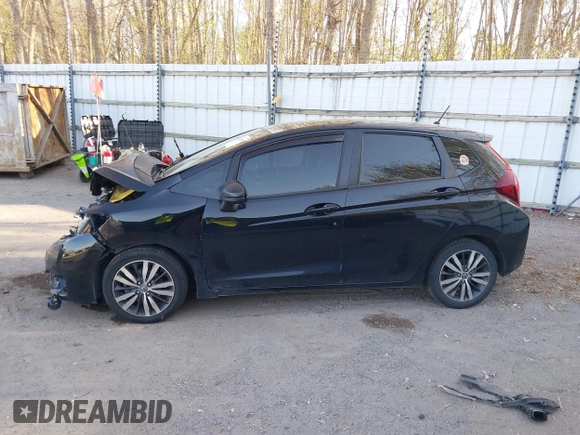 2015 Honda Fit EX with VIN 3HGGK5G82FM744840, listed as a IAAI auction lot 42138045 with 91,321 mi miles and . Bid and sale history available at DreamBid. Image 14.