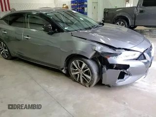 2020 Nissan Maxima SV z VIN 1N4AA6CVXLC369534, wystawiony jako Copart lot #55363295 z przebiegiem 98 438 mil mil oraz Szkoda całkowita • Salvage title. Historia ofert i sprzedaży dostępna na DreamBid. Obrazek 13.