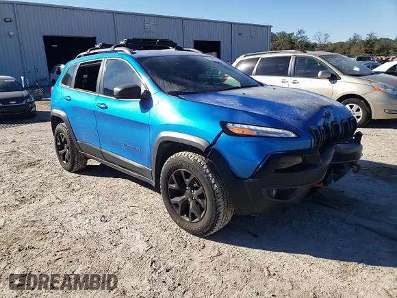 2018 Jeep Cherokee Trailhawk with VIN 1C4PJMBB2JD529915, listed as a Copart auction lot 87686525 with 107,184 mi miles and Salvage Title. Bid and sale history available at carsss.com. Image 12.
