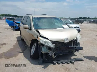 2014 Toyota Sienna LE AAS with VIN 5TDKK3DC1ES462015, listed as a IAAI auction lot 42377582 with Not provided miles and . Bid and sale history available at DreamBid. Image 1.