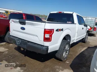2018 Ford F-150 XL with VIN 1FTFX1E50JKD54316, listed as a IAAI auction lot 41994745 with 210,156 mi miles and . Bid and sale history available at DreamBid. Image 4.