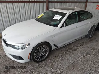 2018 BMW 5 Series 530e with VIN WBAJA9C57JB034128, listed as a IAAI auction lot 41800329 with 66,684 mi miles and . Bid and sale history available at DreamBid. Image 18.