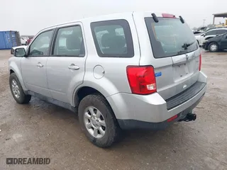 2011 Mazda Tribute Sport with VIN 4F2CY9C7XBKM01050, listed as a IAAI auction lot 41433870 with 122,287 mi miles. Bid and sale history available at carsss.com. Image 3.
