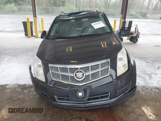 2011 Cadillac SRX Luxury Collection z VIN 3GYFNAEY4BS655011, wystawiony jako IAAI lot #41990104 z przebiegiem 133 246 mil mil oraz . Historia ofert i sprzedaży dostępna na DreamBid. Obrazek 12.