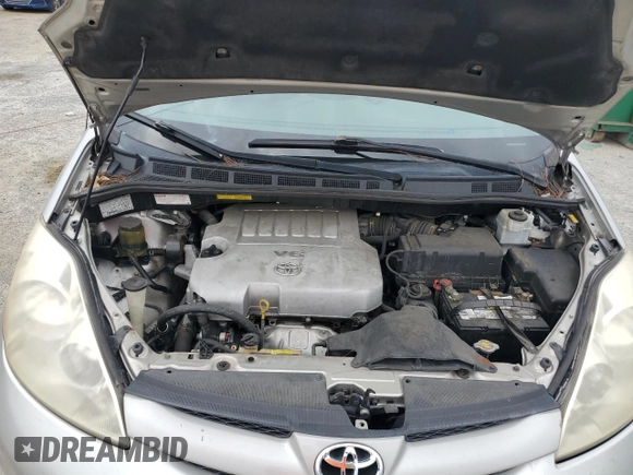 2012 Toyota Sienna XLE AAS with VIN 5TDYK3DC6CS275537, listed as a Copart auction lot 66040605 with 135,148 mi miles and Clean title. Bid and sale history available at DreamBid. Image 12.