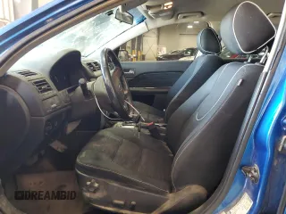 2012 Ford Fusion SE with VIN 3FAHP0HA3CR325781, listed as a Copart auction lot 52038025 with 134,349 mi miles and Salvage Title. Bid and sale history available at DreamBid. Image 7.