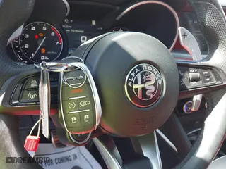 2023 Alfa Romeo Stelvio Ti with VIN ZASPAKBN4P7D63524, listed as a IAAI auction lot 41626631 with 37,731 mi miles. Bid and sale history available at carsss.com. Image 11.