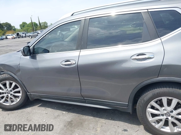 2018 Nissan Rogue S with VIN KNMAT2MT6JP615219, listed as a IAAI auction lot 42038992 with 64,334 mi miles and . Bid and sale history available at carsss.com. Image 14.