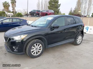 2014 Mazda CX-5 Touring with VIN JM3KE2CY9E0317278, listed as a IAAI auction lot 41991778 with 130,122 mi miles. Bid and sale history available at carsss.com. Image 17.