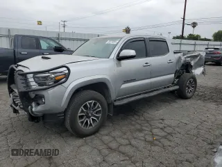 2022 Toyota Tacoma SR5 with VIN 3TMBZ5DN0NM036437, listed as a Copart auction lot 56378884 with 23,562 mi miles and Salvage title. Bid and sale history available at DreamBid. Image 1.