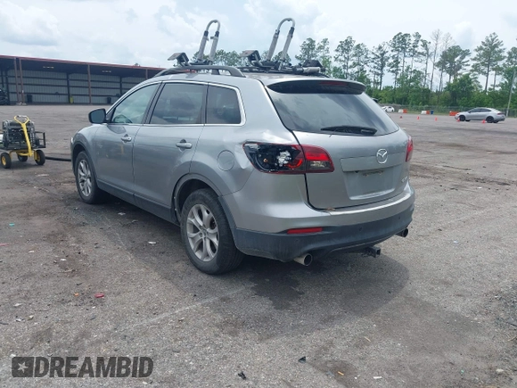 2015 Mazda CX-9 Touring z VIN JM3TB2CA1F0455916, wystawiony jako IAAI lot #42226924 z przebiegiem 157 643 mil mil oraz . Historia ofert i sprzedaży dostępna na DreamBid. Obrazek 3.