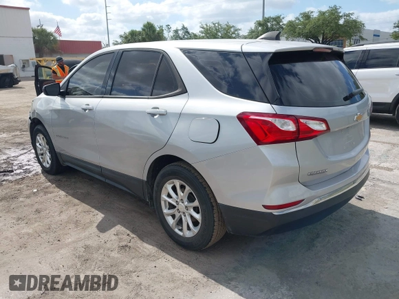 2018 Chevrolet Equinox LS with VIN 2GNAXHEV1J6110087, listed as a IAAI auction lot 42175959 with 124,611 mi miles and . Bid and sale history available at DreamBid. Image 3.
