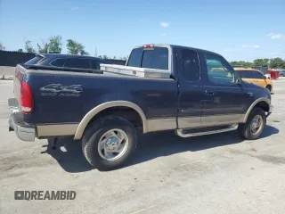 2000 Ford F-150 XL with VIN 1FTRX18L0YNB65908, listed as a Copart auction lot 54797585 with 298,924 mi miles and Clean title. Bid and sale history available at DreamBid. Image 3.