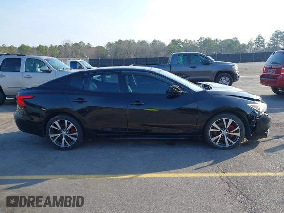 2016 Nissan Maxima SL z VIN 1N4AA6AP1GC383512, wystawiony jako IAAI lot #41490666 z przebiegiem 110 235 mil mil oraz . Historia ofert i sprzedaży dostępna na DreamBid. Obrazek 13.