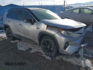 2020 Toyota RAV4 Hybrid XSE with VIN JTMEWRFV3LD551306, listed as a IAAI auction lot 41686849 with 98,502 mi miles and . Bid and sale history available at DreamBid. Image 1.