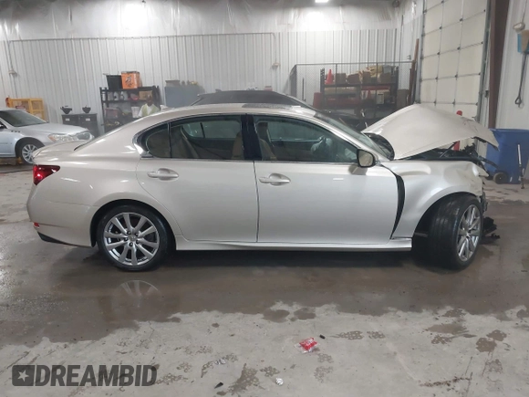 2013 Lexus GS 350 z VIN JTHCE1BL3D5003526, wystawiony jako IAAI lot #42410101 z przebiegiem 88 814 mil mil oraz . Historia ofert i sprzedaży dostępna na DreamBid. Obrazek 14.