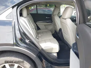 2019 Cadillac XT4 AWD Luxury z VIN 1GYFZBR41KF150209, wystawiony jako IAAI lot #42325529 z przebiegiem 76 828 mil mil oraz . Historia ofert i sprzedaży dostępna na DreamBid. Obrazek 8.