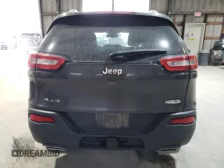 2015 Jeep Cherokee Latitude with VIN 1C4PJMCS7FW504728, listed as a Copart auction lot 81674984 with 144,342 mi miles and Salvage Title. Bid and sale history available at carsss.com. Image 6.