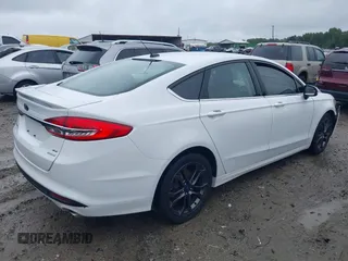 2018 Ford Fusion SE with VIN 3FA6P0HD6JR153230, listed as a IAAI auction lot 40336904 with 71,949 mi miles and . Bid and sale history available at DreamBid. Image 4.