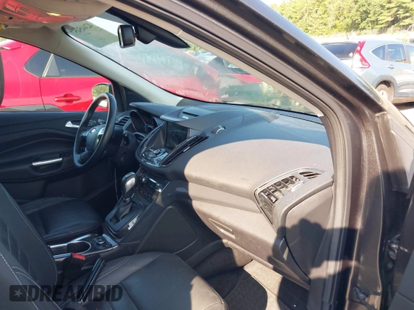 2016 Ford Escape Titanium with VIN 1FMCU9J99GUB27573, listed as a IAAI auction lot 42445457 with 156,784 mi miles and . Bid and sale history available at DreamBid. Image 5.