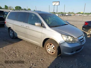 2007 Honda Odyssey EX-L with VIN 5FNRL38677B449602, listed as a IAAI auction lot 42030774 with 179,563 mi miles. Bid and sale history available at carsss.com. Image 1.