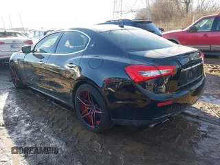 2014 Maserati Ghibli z VIN ZAM57XSA4E1090315, wystawiony jako IAAI lot #41423507 z przebiegiem 115 323 mil mil oraz . Historia ofert i sprzedaży dostępna na DreamBid. Obrazek 3.