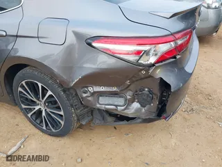 2018 Toyota Camry LE with VIN 4T1B11HK3JU630411, listed as a IAAI auction lot 41423338 with 134,959 mi miles. Bid and sale history available at carsss.com. Image 6.