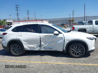 2020 Mazda CX-9 Sport with VIN JM3TCABY1L0406720, listed as a IAAI auction lot 42304144 with 75,887 mi miles and . Bid and sale history available at DreamBid. Image 13.