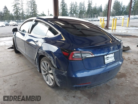 2018 Tesla Model 3 Long Range Battery z VIN 5YJ3E1EA7JF035949, wystawiony jako IAAI lot #41627027 z przebiegiem Nie podano mil oraz . Historia ofert i sprzedaży dostępna na DreamBid. Obrazek 3.