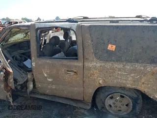 2003 Chevrolet Suburban LT z VIN 3GNEC16Z23G120835, wystawiony jako IAAI lot #41885363 z przebiegiem Nie podano mil oraz . Historia ofert i sprzedaży dostępna na DreamBid. Obrazek 16.