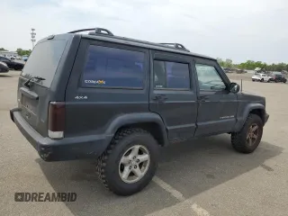 1999 Jeep Cherokee Sport with VIN 1J4FF68S9XL635836, listed as a Copart auction lot 59573195 with 187,035 mi miles and Salvage title. Bid and sale history available at DreamBid. Image 3.
