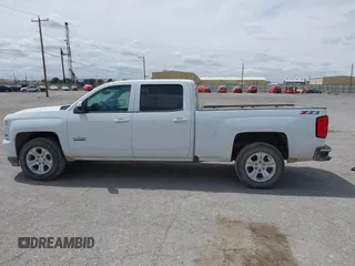 2018 Chevrolet Silverado 1500 LT with VIN 1GCUKREC5JF133998, listed as a IAAI auction lot 41880805 with 166,258 mi miles and . Bid and sale history available at DreamBid. Image 14.