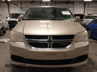 2013 Dodge Grand Caravan SXT with VIN 2C4RDGCG0DR567186, listed as a IAAI auction lot 41706119 with 112,512 mi miles and . Bid and sale history available at DreamBid. Image 13.