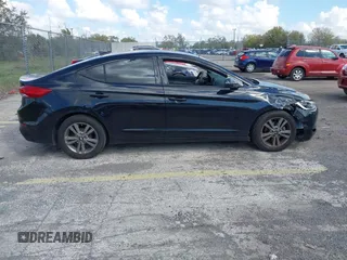 2017 Hyundai Elantra Limited z VIN 5NPD84LF2HH018421, wystawiony jako IAAI lot #41678556 z przebiegiem 152 256 mil mil oraz . Historia ofert i sprzedaży dostępna na DreamBid. Obrazek 13.