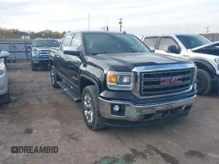 2014 GMC Sierra 1500 SLT with VIN 3GTP1VEC9EG404865, listed as a IAAI auction lot 40850083 with 50,176 mi miles and . Bid and sale history available at DreamBid. Image 1.