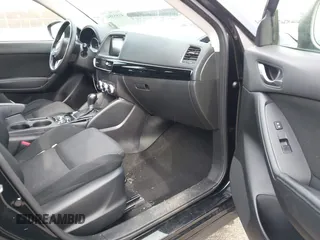 2016 Mazda CX-5 Sport with VIN JM3KE4BY7G0893578, listed as a IAAI auction lot 41853840 with 95,937 mi miles. Bid and sale history available at carsss.com. Image 5.