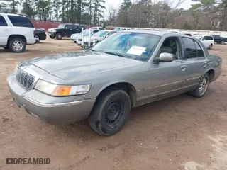 1998 Mercury Grand Marquis LS with VIN 2MEFM75W8WX687967, listed as a IAAI auction lot 41626058 with 135,183 mi miles. Bid and sale history available at carsss.com. Image 2.