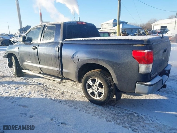 2010 Toyota Tundra 4WD Truck with VIN 5TFUW5F11AX120069, listed as a IAAI auction lot 41378490 with 413,655 mi miles. Bid and sale history available at carsss.com. Image 3.