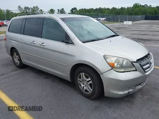 2007 Honda Odyssey EX-L z VIN 5FNRL38647B426620, wystawiony jako IAAI lot #42059093 z przebiegiem 258 622 mil mil oraz . Historia ofert i sprzedaży dostępna na DreamBid. Obrazek 1.