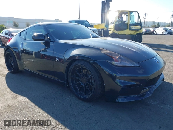 2016 Nissan 370Z with VIN JN1AZ4EH1GM933265, listed as a IAAI auction lot 41831484 with 98,193 mi miles. Bid and sale history available at carsss.com. Image 1.