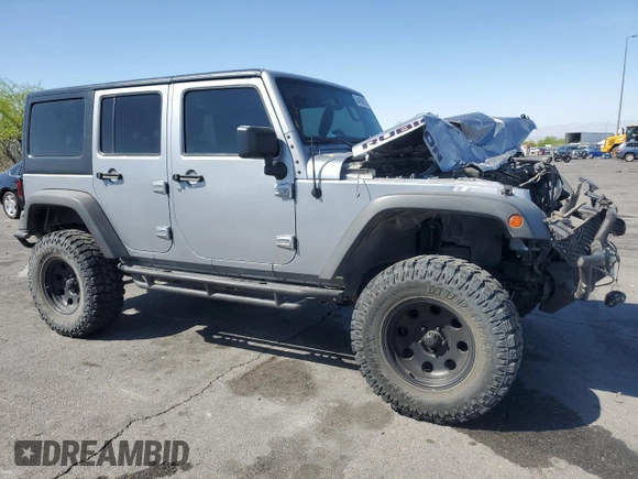 2014 Jeep Wrangler Unlimited Rubicon X with VIN 1C4BJWFG2EL308077, listed as a Copart auction lot 54439265 with 160,746 mi miles and Salvage title. Bid and sale history available at DreamBid. Image 4.